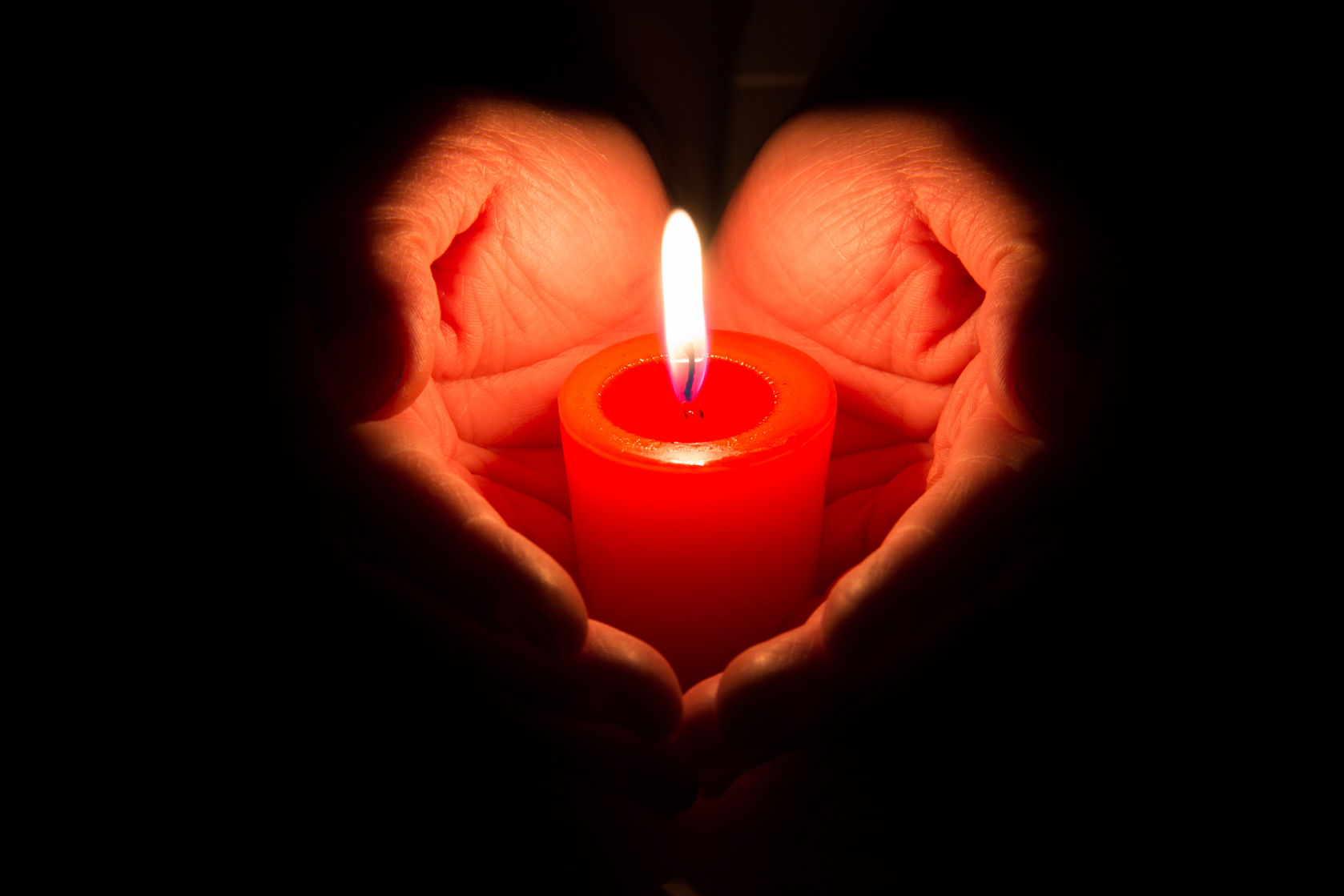 Heart Hands Holding a Candle.jpg