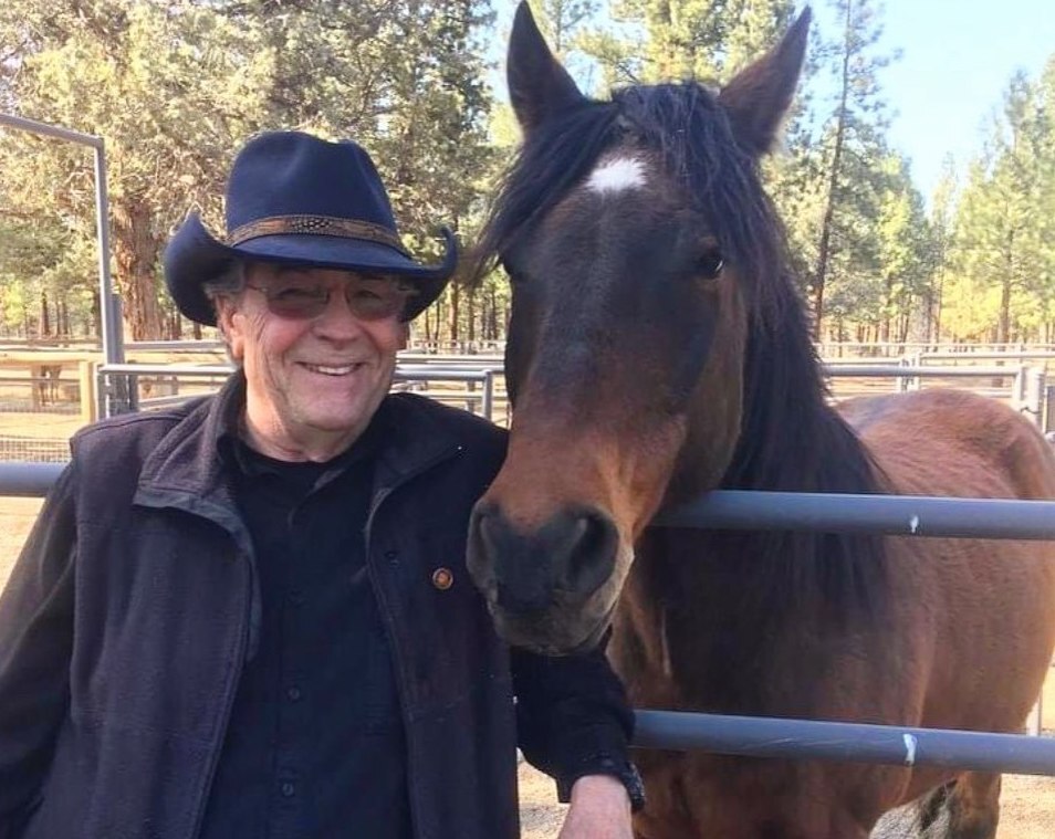 john w james with rescued horse sisters oregon
